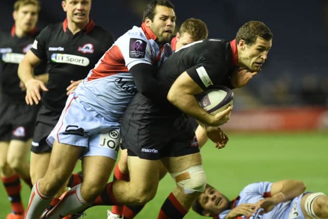 Tim Visser attempts to evade the attentions of Thibault Regard. Picture: SNS