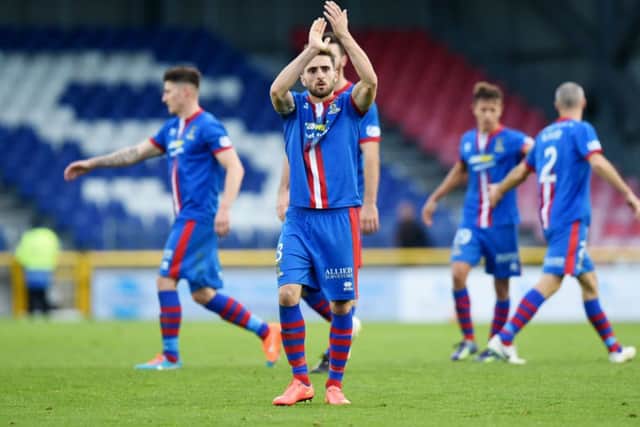 ICT captain Graeme Shinnie applauds the home support after the win. Picture: SNS