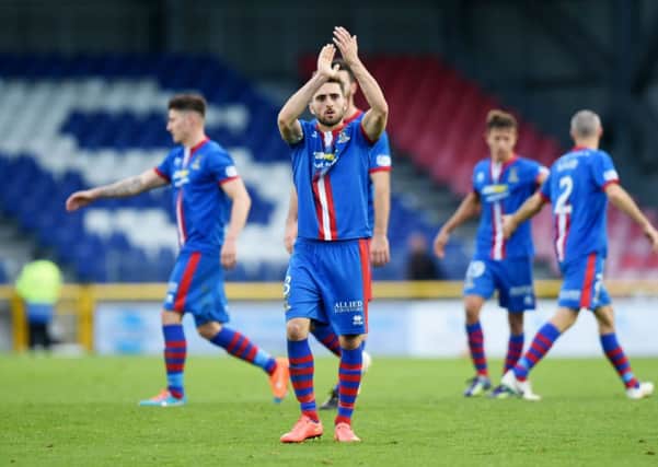 ICT captain Graeme Shinnie applauds the home support after the win. Picture: SNS