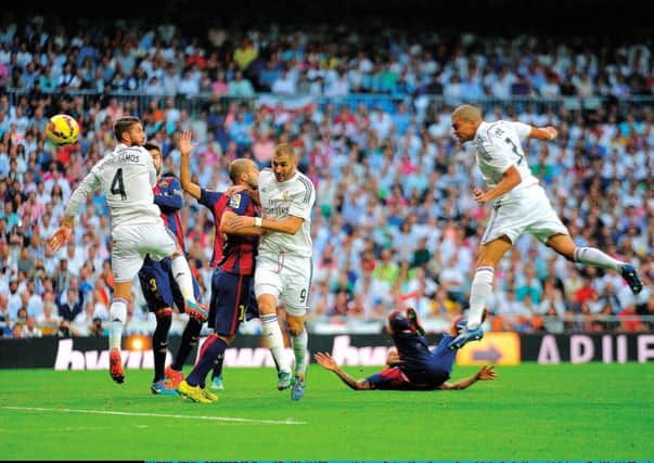 Pepe rises to head Real Madrid 2-1 ahead in the Clasico. Picture: Getty