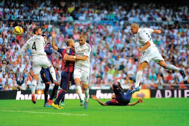 Pepe rises to head Real Madrid 2-1 ahead in the Clasico. Picture: Getty