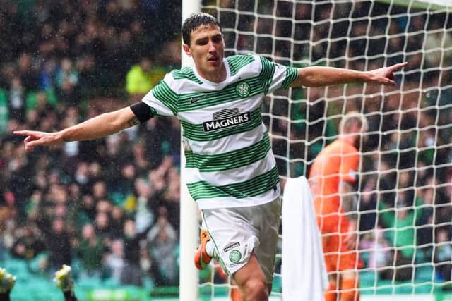 Celtic's Stefan Scepovic celebrates after scoring his side's second goal of the game. Picture: SNS