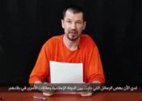 John Cantlie appears to read from a script in a video released by the Islamic State. Picture: YouTube