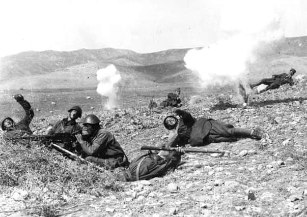 Greek soldiers practice throwing hand grenades after Mussolinis Italy invaded. Picture: Getty