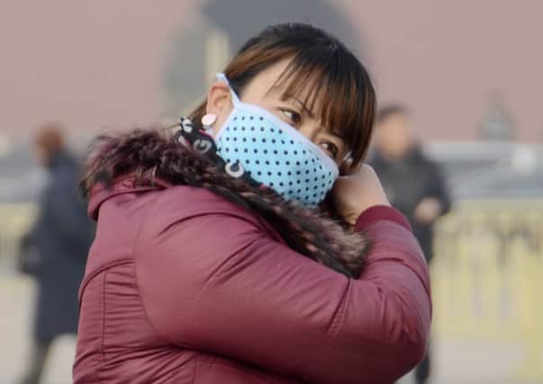 Beijing has been enveloped by thick fog for the past few days. Picture: Getty