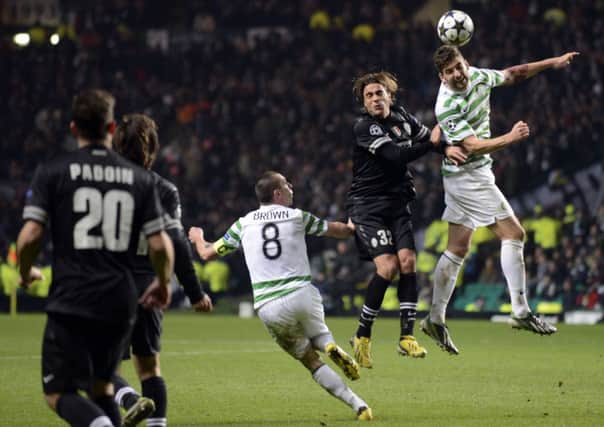 Charlie Mulgrew in the thick of the action during the match at Parkhead. Picture: Phil Wilkinson