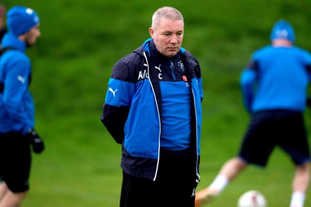 Rangers manager Ally McCoist has been told his job is safe for the forseeable future. Picture: SNS