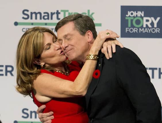 Newly elected moderate John Tory with wife Barbara Hackett. Picture: AP