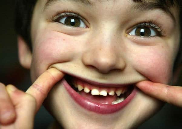 Dental health among school pupils in Scotland has shown a slight improvement, according to a new report. Picture: PA