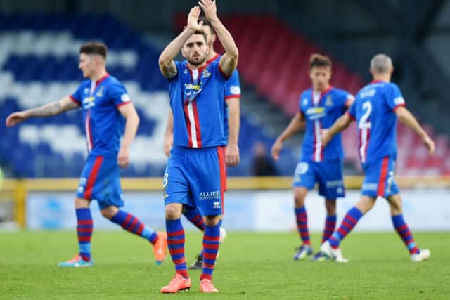 Captain Graeme Shinnie applauds the home support after ICT's win over Dundee United. Picture: SNS