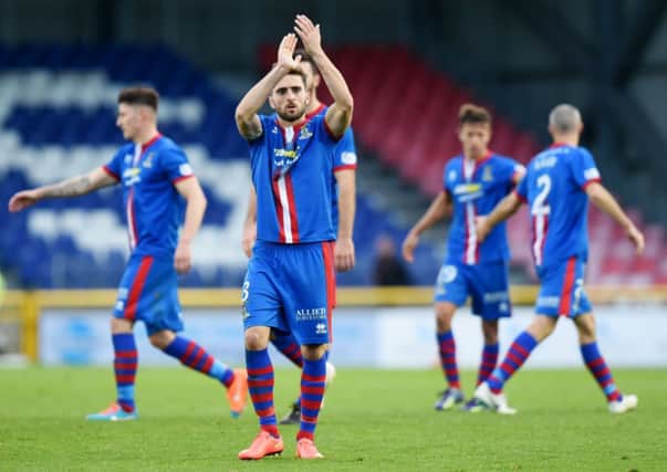 Captain Graeme Shinnie applauds the home support after ICT's win over Dundee United. Picture: SNS
