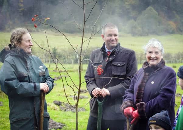 Margaret Murison, right, planted a rowan in memory of her grandfather and uncle. Picture: Helen Pugh