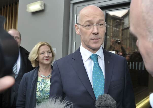 John Swinney said the figures showed that the government are continuing to tackle unemployment and that the Scottish economy is growing. Picture: TSPL