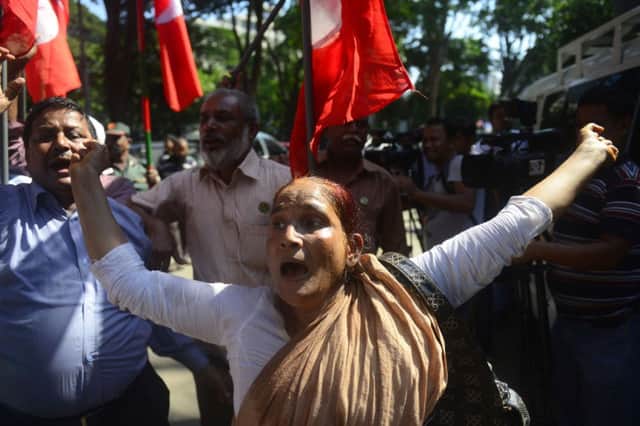 Former independence activists outside the Dhaka court after the verdict. Picture: AFP