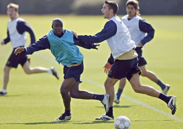 Lassana Diarra, pictured in training with former team mate Robin Van Persie, is reportedly a target for Celtic. Picture: Getty