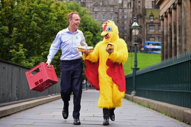 Jim Murphy, plus crate and chicken, campaigning in Edinburgh last month. Picture: Getty