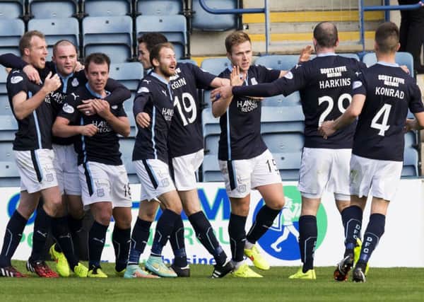 Dundee players celebrate against Hamilton. Picture: SNS