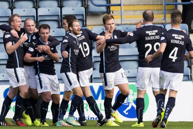 Dundee players celebrate against Hamilton. Picture: SNS