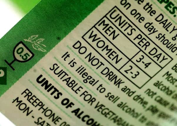 Alcohol units per day warning labels are already placed on alcholic drinks but now their are calls for calorific content to be displayed also. Picture: PA