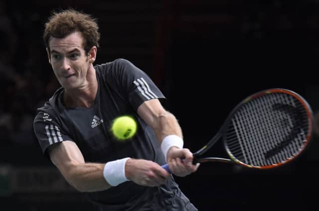 Andy Murray returns the ball to Novak Djokovic in Paris. Picture: Getty