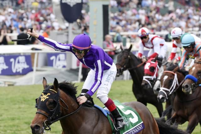 Jockey Lanfranco Dettori celebrates aboard Hootenanny. Picture: Getty