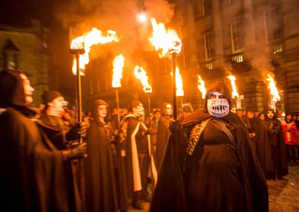 People celebrate the Samhuinn Fire Festival in Edinburgh. Picture: Ian Georgeson