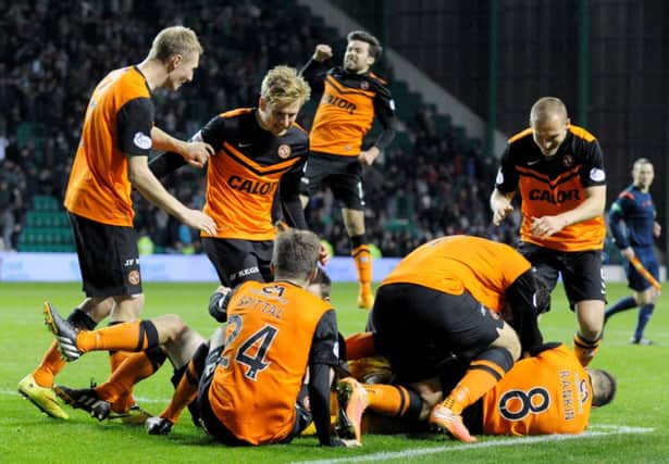 Dundee United celebrate after advancing in the League Cup. Picture: Jane Barlow