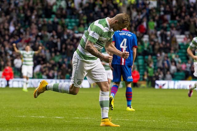 Celtic star John Guidetti charges off to celebrate his opener. Picture: SNS