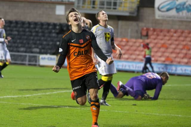 Charlie Telfer screams with joy after scoring against St Mirren. Picture: SNS