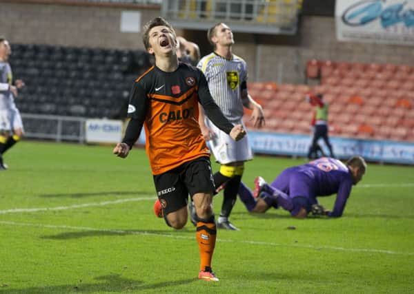 Charlie Telfer screams with joy after scoring against St Mirren. Picture: SNS
