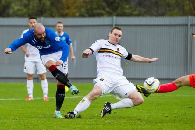 Kris Boyd scores the only goal of the game. Picture: SNS