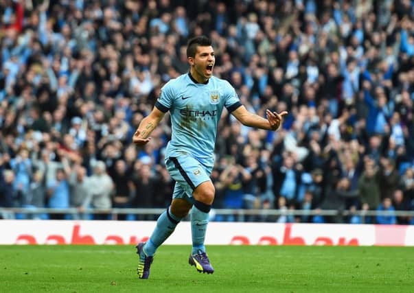 Sergio Aguero celebrates scoring the opening goal. Picture: Getty