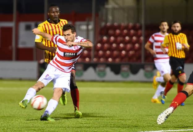 Hamilton's Tony Andreu scores his side's late equaliser. Picture: SNS