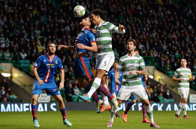 Virgil van Dijk competes with Inverness defender Gary Warren. Picture: SNS