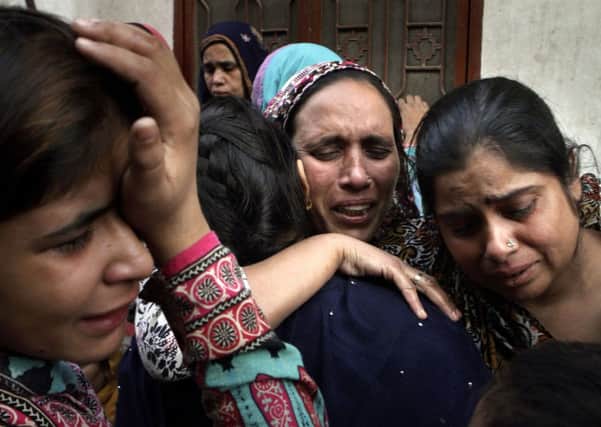 Pakinstani women mourn a family member killed in Sundays attack. Picture: AP