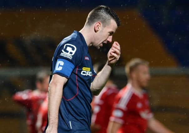 Dejection for Ross County's Paul Quinn as he scores a own goal. Picture: SNS