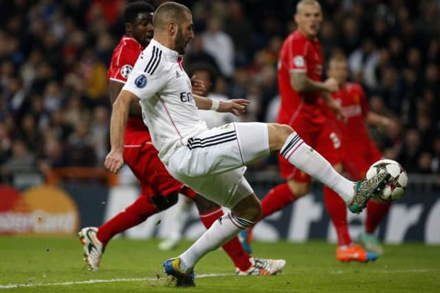 Karim Benzema connects with a precise Marcelo cross to score the only goal of last nights Champions League Group B fixture. Picture: Reuters