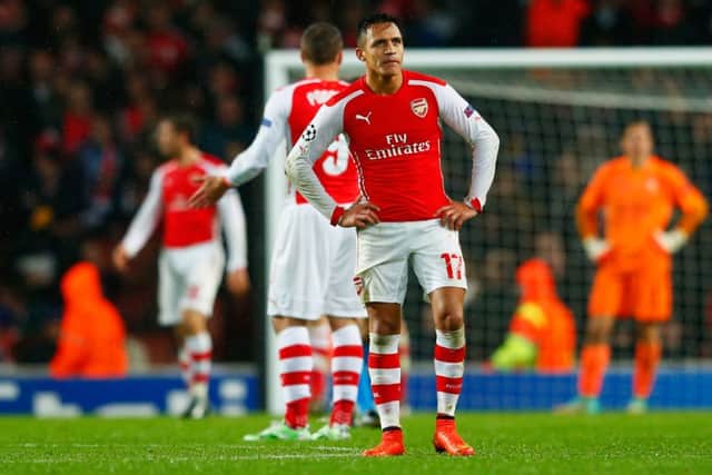 Despair for Alexis Sanchez of Arsenal as Aleksandar Mitrovic of Anderlecht (not pictured) scores their third goal. Picture: Getty