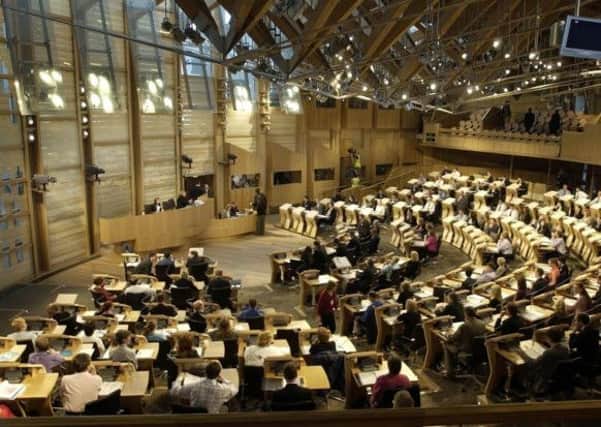 Prof MacDonald said MSPs must recognise decisions taken by the Scottish Parliament have real costs and that increased spending means taxes will have to go up to finance it. Picture: PA
