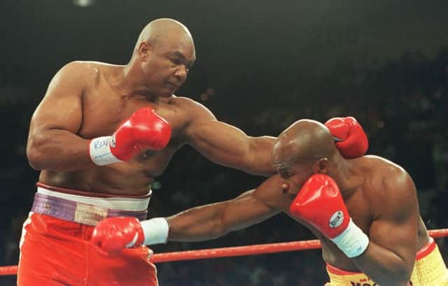 On this day in 1994, George Foreman, 46, became the oldest boxer to win a world title when he knocked out Michael Moorer. Picture: Getty