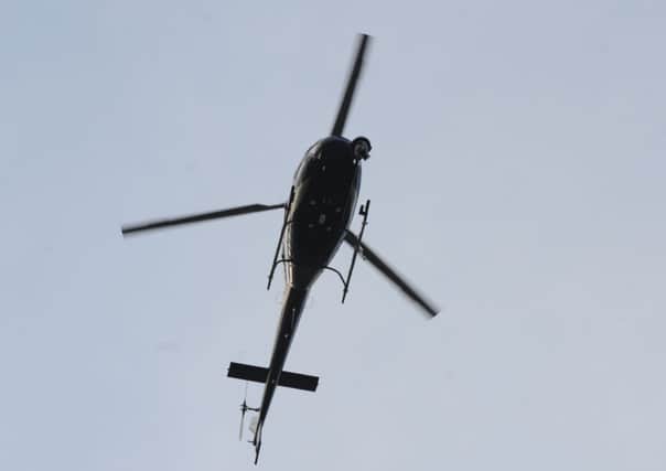 The police helicopter was scrambled today to help find a young man missing from his home since Halloween. Picture: Ian Rutherford