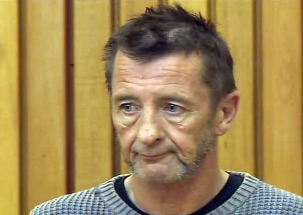 AC/DC drummer Phil Rudd made a brief appearance at the Tauranga District Court in New Zealand and was charged with attempting to procure murder. Picture: Getty
