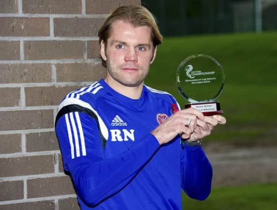 Robbie Neilson receives the Championship Manager of the Month Award. Picture: SNS