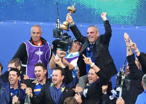 Winning captain Paul McGinley is held aloft by his team at Gleneagles. Picture: Ian Rutherford