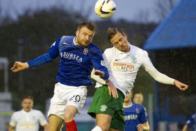 Cowdenbeath's Kyle Miller battles for the ball with Danny Handling. Picture: SNS