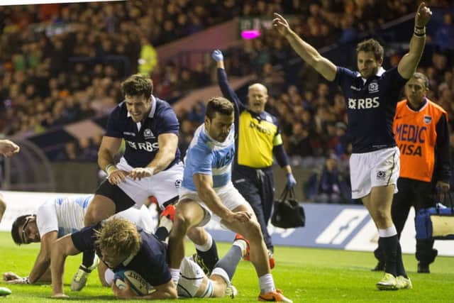 Scotland's Jonny Gray goes over for a try at BT Murrayfield. Picture: PA