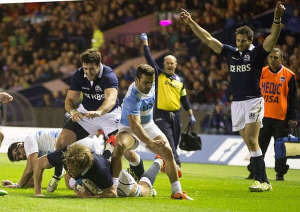 Scotland's Jonny Gray goes over for a try at BT Murrayfield. Picture: PA