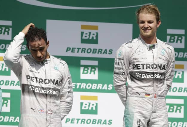 Nico Rosberg, right, beat his Mercedes team-mate Lewis Hamilton by 1.4 seconds at Interlagos. Picture: AP