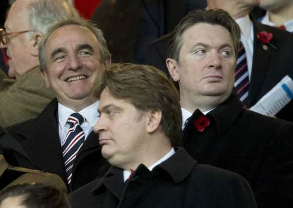 Sandy Easdale (right) and brother James (front) with Rangers Director Derek Llambias during the Falkirk game. Picture: SNS