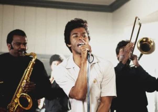 Chadwick Boseman creates convincing on-stage moves, letting Brown do the singing. Picture: Contributed